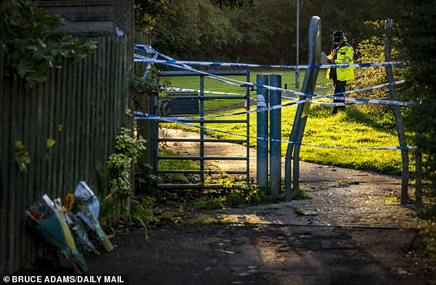Flowers left at the scene at the entrance to Franklin Park where Mr Kohli was allegedly attacked