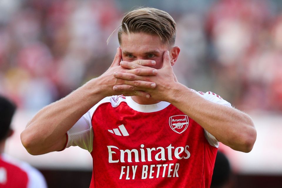Viktor Gyokeres of Arsenal celebrating with his hands over his face.