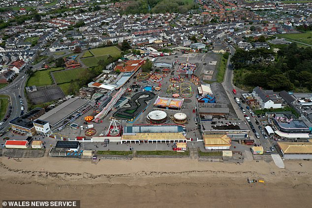 The Wacky Worm ride is described as 'The perfect first thrill ride for the kids. This small introductory roller coaster for the kids will get them screaming.' Pictured: Coney beach Pleasure Park in Porthcawl