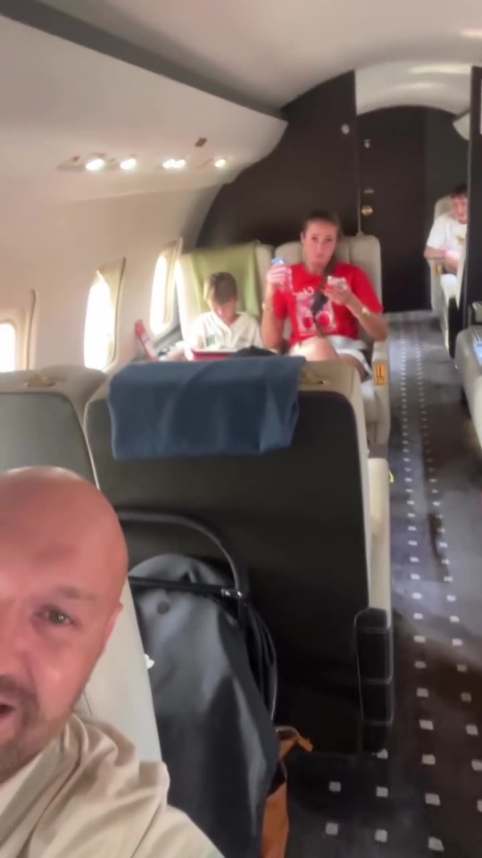 Tyson Fury on a private jet with his family.