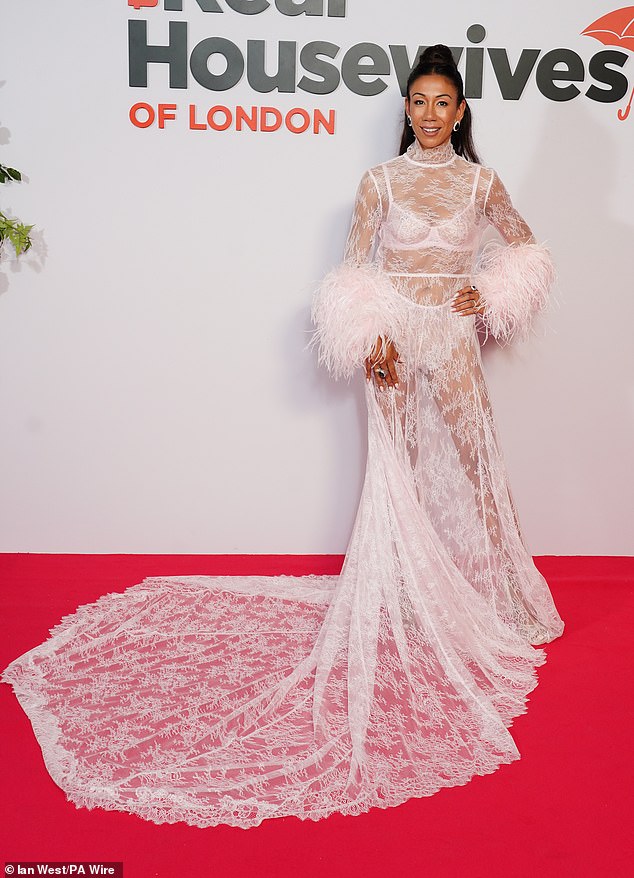 Nessie Welschinger showed off her amazing figure as she flashed her underwear in a white lace sheer dress