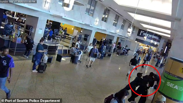Footage of the Olympic star shoving her partner at Seattle-Tacoma International Airport