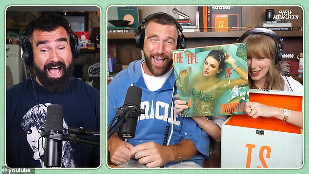She unveiled the front cover and named the 12 songs to Travis and Jason on the show