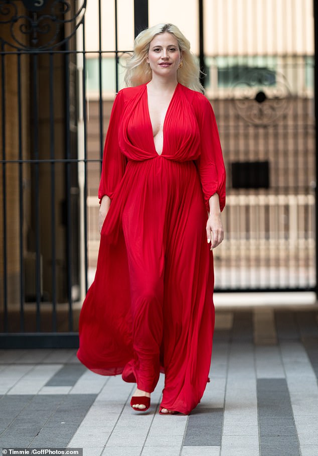 For her latest outing, Pixie wowed in a plunging red gown