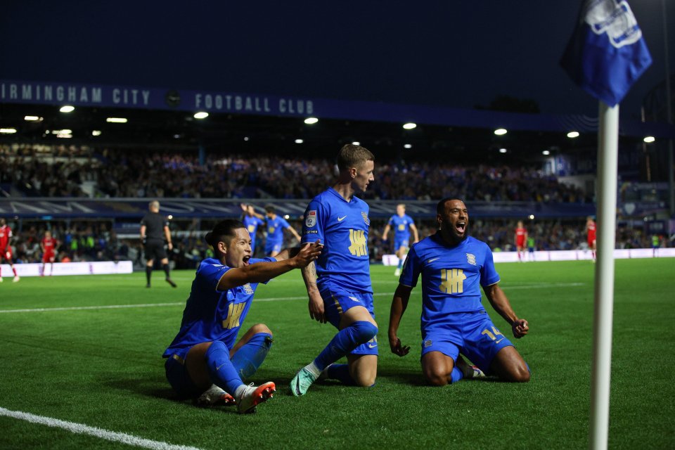 Birmingham City players celebrating a goal.