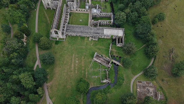 The interior was divided into aisles by rows of columns, which show up in the parch marks