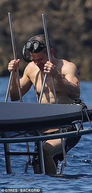 The Accountant 2 producer hoisted himself up the ladder back on the yacht