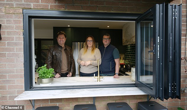 Gemma and Scott, pictured here with George, said they were 'blown away' by the transformation of their home