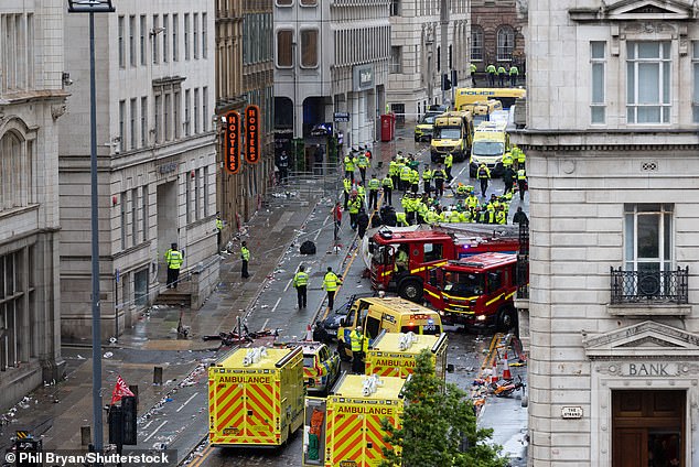 The scene of devastation after a car drove into Liverpool fans during Premier League celebrations in May this year