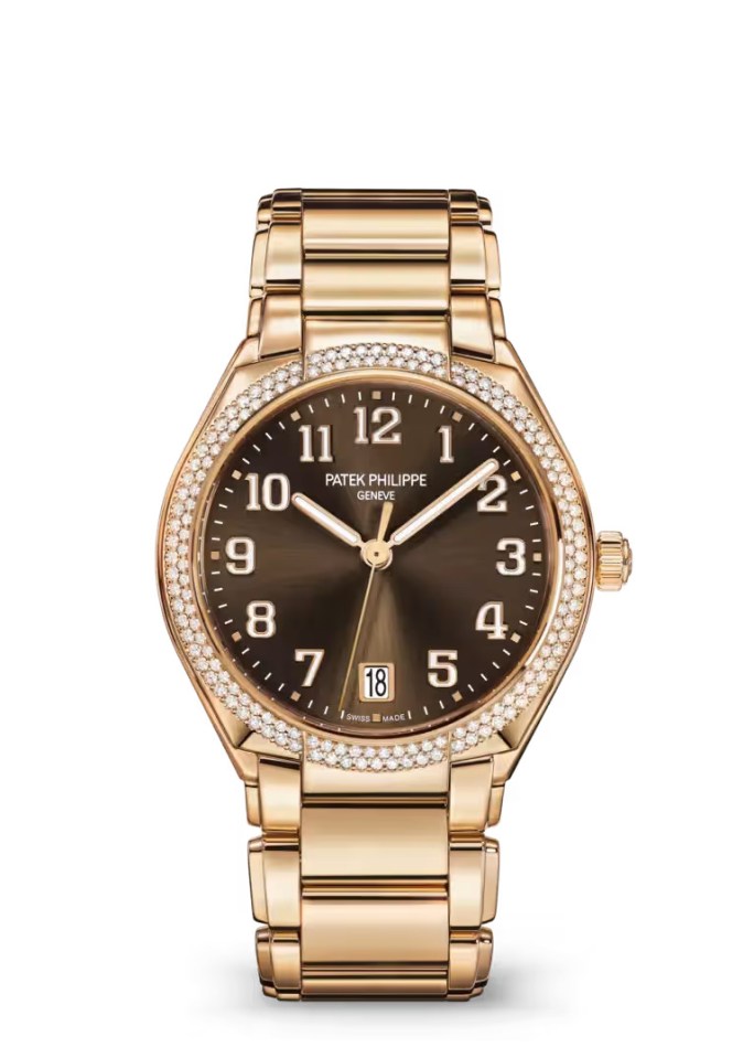 Rose gold Patek Philippe watch with diamond bezel and brown face.