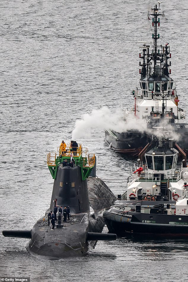 The naval base is the Royal Navy's headquarters in Scotland and is home to Britain's nuclear submarines which includes the Vanguard vessels armed with Trident missiles