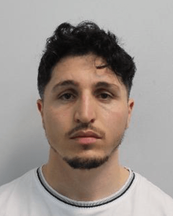 Mugshot of Ahmad Ghiasi.