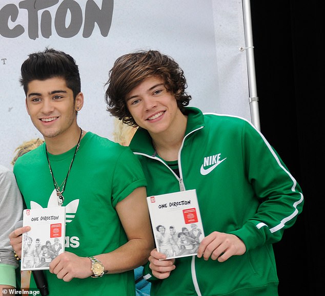 Other photos taken by Corona show the One Direction stars sitting at a table with silly string sprayed over a picture of their faces behind them