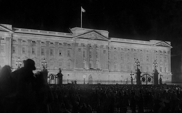 Jubilant crowds outside Buckingham Palace in the early hours of August 16, 1945