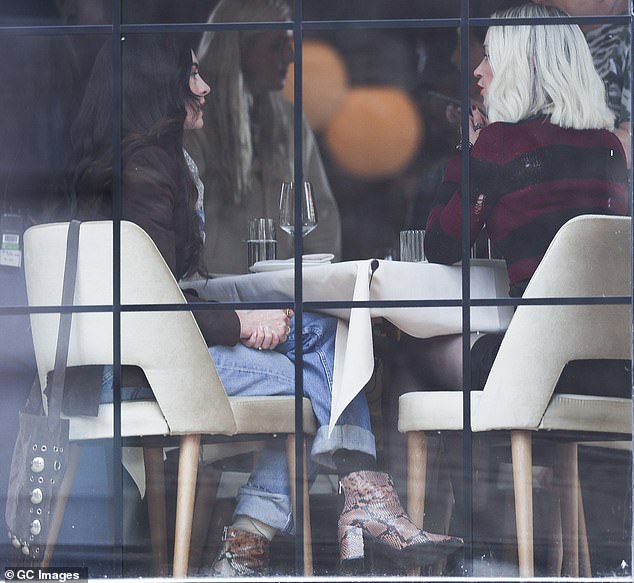 The scene she was filming involved a restaurant meeting with Anne, who could be spotted sitting with her at an elegant table