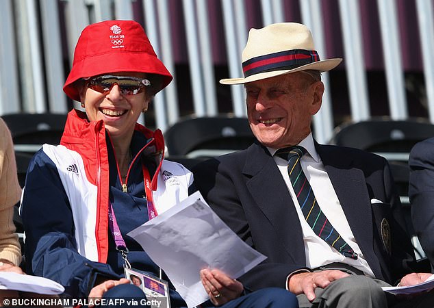 Anne and her father Prince Philip at the 2012 Olympics. Anne, like Philip, is reportedly planning to wind down her royal duties as she approaches her 80th and then 90th birthday