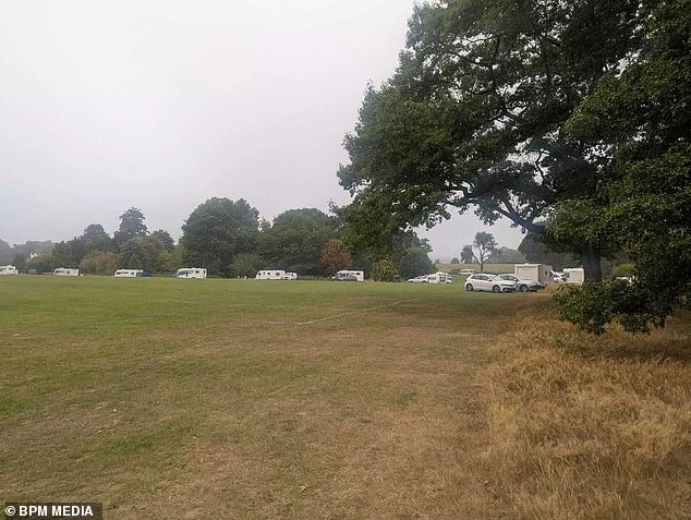 The dozens of caravans and as many cars and vans appeared overnight to set up camp on one of the playing fields