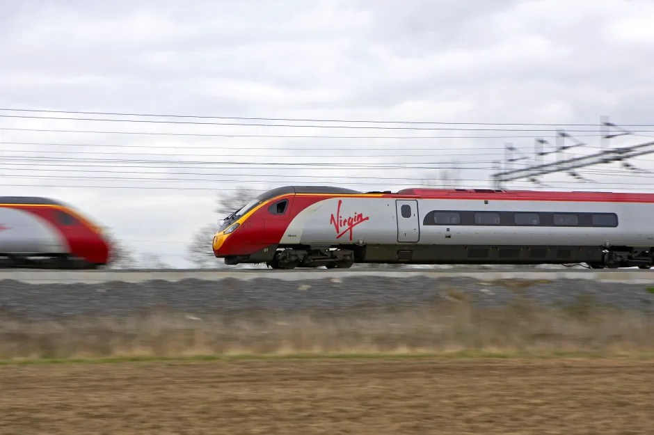 Two Virgin Pendolino trains in motion.