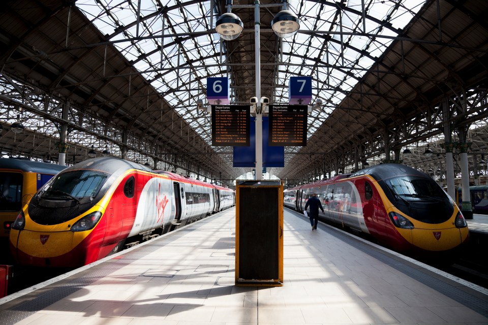 Two Virgin Trains at Manchester Piccadilly station.