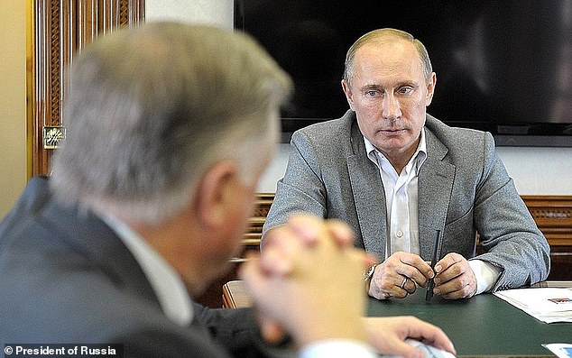 Putin's face appears much thinner as he travels in an armored train in 2012