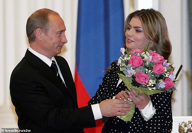 Alina Kabaeva and Vladimir Putin at an event in Kremlin, Russia