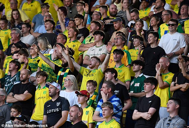 Norwich City fans cram into the compact away end at Vicarage Road this week for their Carabao Cup tie against Watford