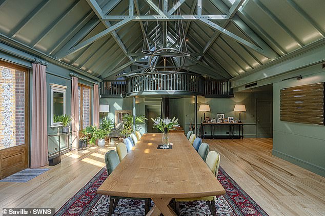 The cottage has sitting room, kitchen, downstairs bedroom suite and mezzanine bedroom suite