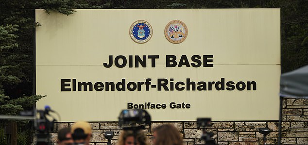 Mandatory Credit: Photo by Xinhua/Shutterstock (15442219i) Journalists work in front of the sign of Joint Base Elmendorf-Richardson in Anchorage, Alaska, the United States, on Aug. 14, 2025. The one-on-one meeting between Russian President Vladimir Putin and U.S. President Donald Trump is scheduled for Friday in Anchorage. u.s. Alaska Anchorage Joint Base Elmendorf Richardson - 14 Aug 2025