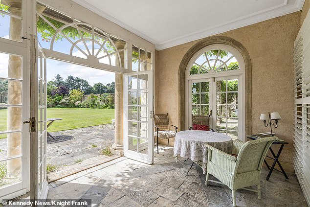 The stunning view through double doors looking out into the garden