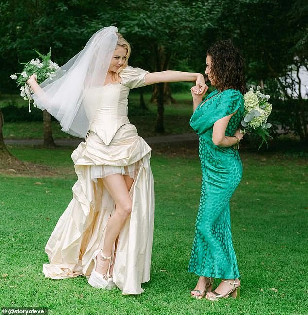 Jamie-Lee was the epitome of elegance in a scooped necked green silk gown and larked about with the bride following the ceremony