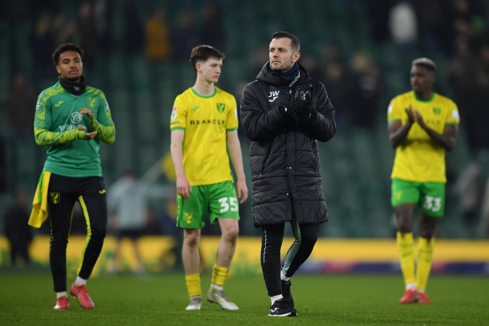 Jack Wilshere, Head of Norwich City, applauding with players after a soccer match.