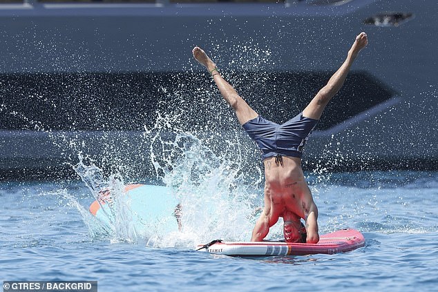 Wanting to get in on the fun, Dua's shirtless fiancé Callum Turner was even spotted getting in on the action as he showed off his skilful moves