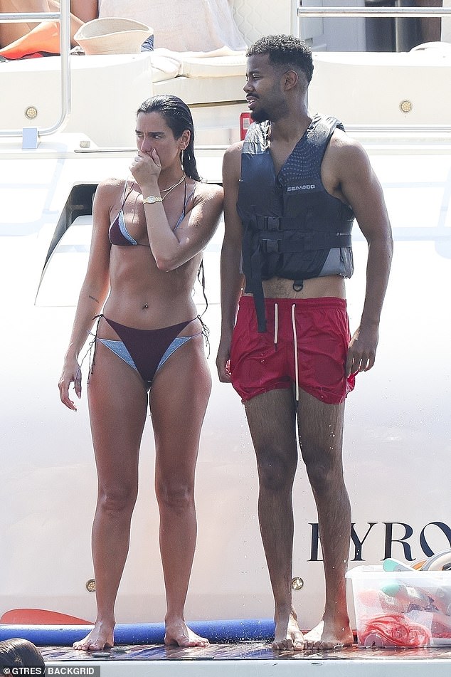 Dua showcased her impressive physique while standing on the yacht