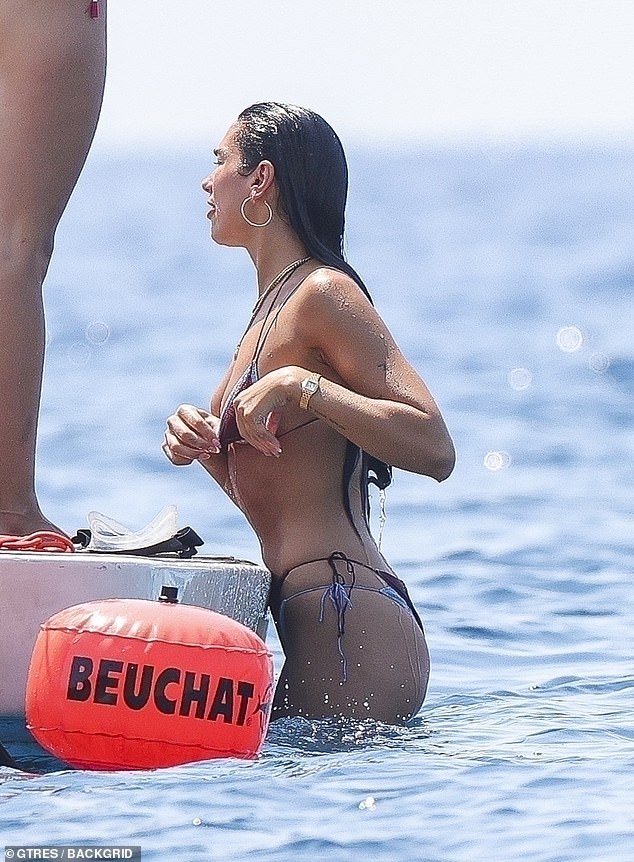Dua sent temperatures soaring as she jumped out of the water