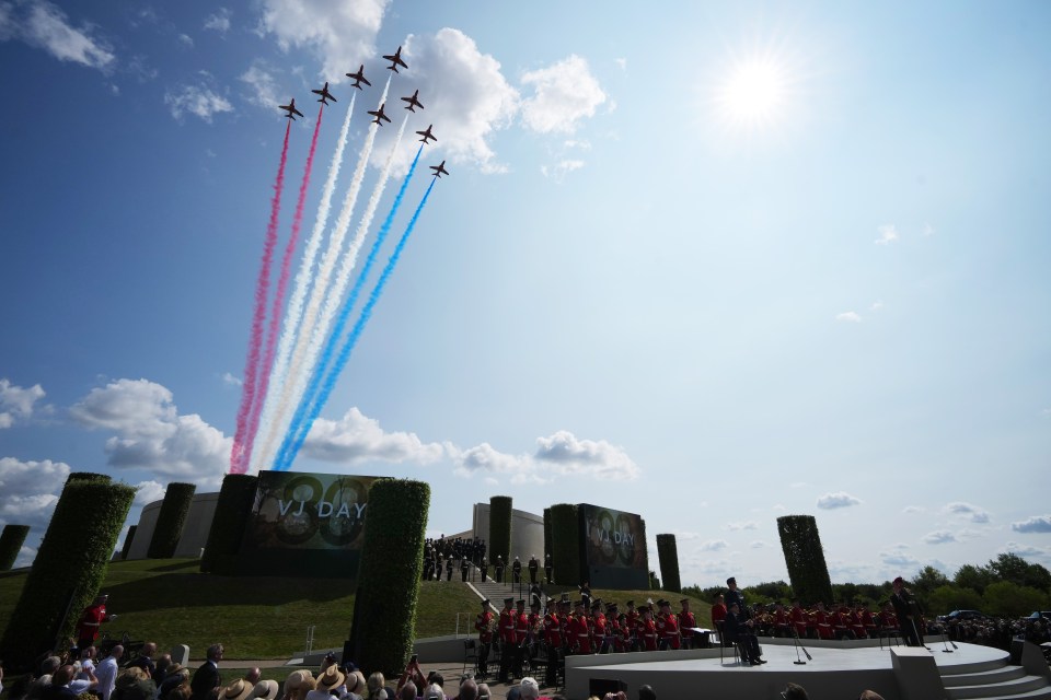 Red Arrows flypast at a VJ Day commemoration service.