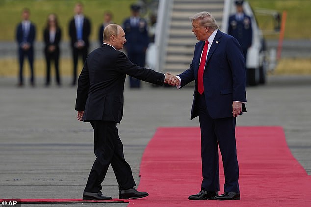 President Donald Trump (right) rolled out the red carpet for Russian President Vladimir Putin (left), shaking hands with the Russian leader at the top of their meetings at Joint Base Elmendorf-Richardson in Alaska on Friday