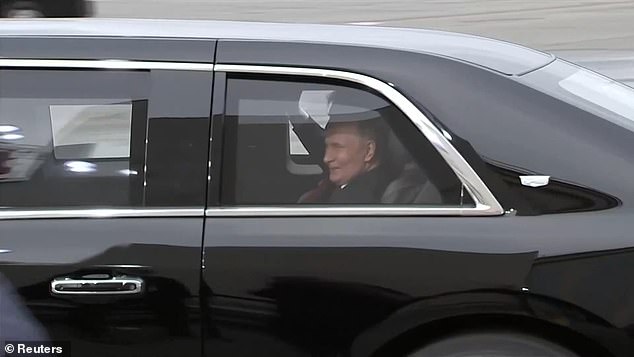 President Donald Trump and Russian President Vladimir Putin are photographed taking a ride in the Beast to their meeting site in Alaska on Friday