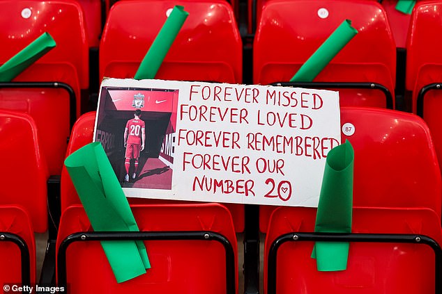 Messages dedicated to the Portuguese striker were left on seats in the Kop, with the above reading: 'Forever missed, forever loved, forever remembered, forever our number 20'