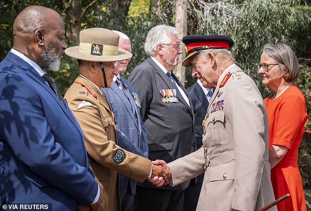 King Charles III greets Silas Ackah Sarbah and Warrant Officer Class Two, Khadak Bahadur Chhetri