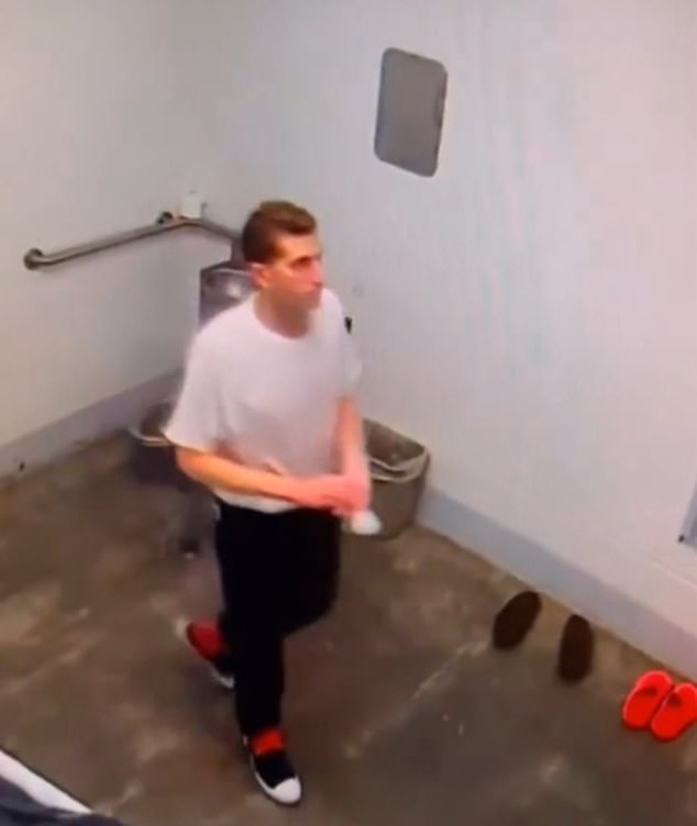 Kohberger is seen pacing his spartan cell, with two pairs of prison-issue shoes on its floor