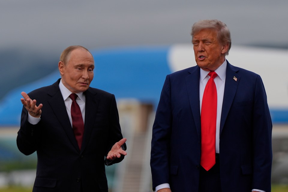 President Trump and Vladimir Putin speaking.