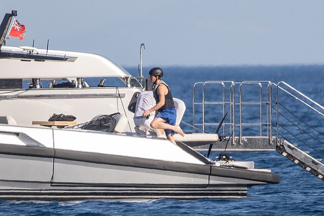 David Beckham and wife Victoria Beckham on their yacht Seven in Tuscany.Joined by son Cruz and girlfriend Jackie