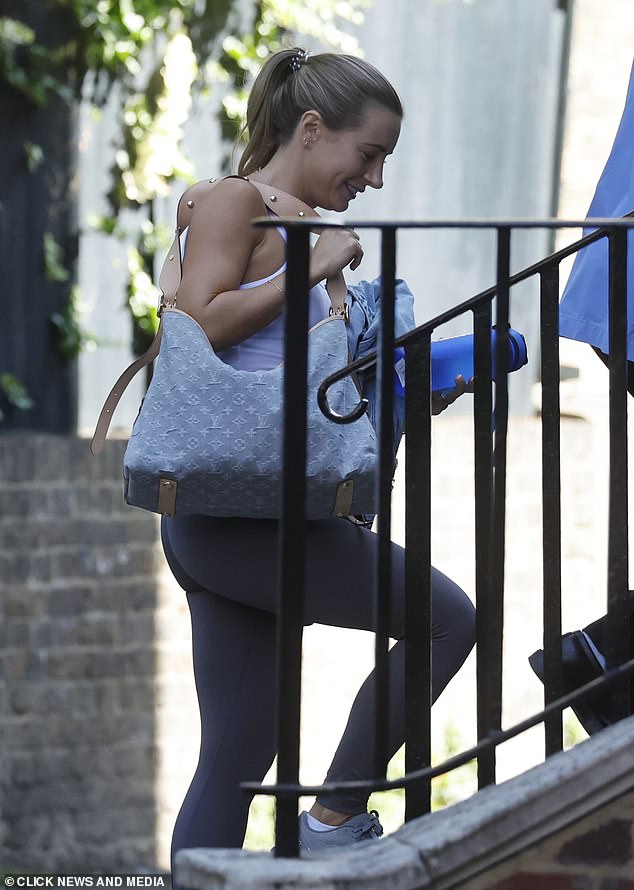 Love Island's Dani gave a shy smile as she ascended the stairs