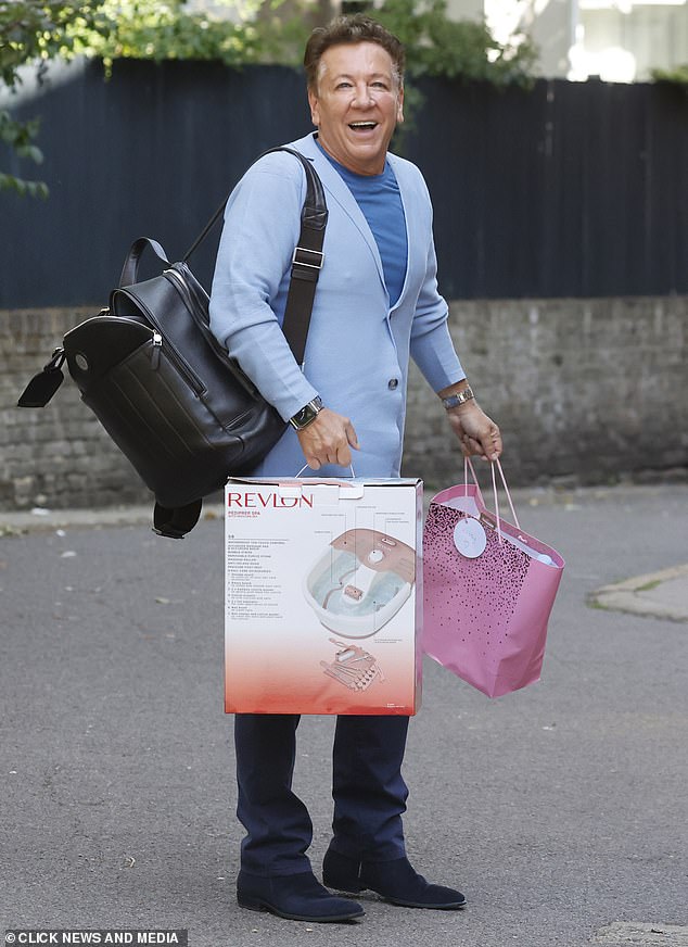 The showbiz reporter was perhaps anticipating sore feet as he brought along a foot spa