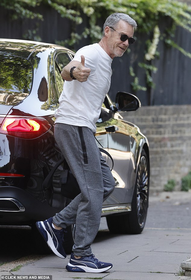 Stefan Dennis gave a cheerful thumbs up on arrival