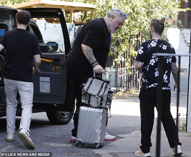 The Game of Thrones star wheeled in luggage towards the entrance