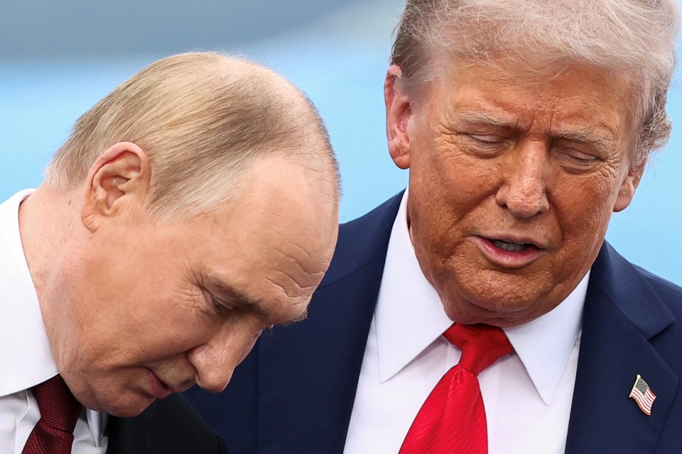 U.S. President Donald Trump speaks with Russian President Vladimir Putin, as they meet to negotiate for an end to the war in Ukraine, at Joint Base Elmendorf-Richardson in Anchorage, Alaska, U.S., August 15, 2025. REUTERS/Kevin Lamarque