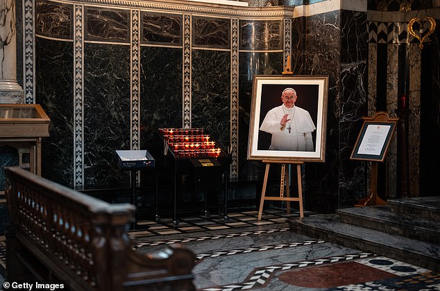 A picture of the late Pope Francis is displayed in Westminster Cathedral on May 9