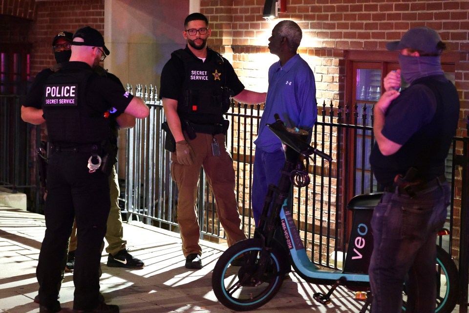 Federal agents arresting a man in Washington, DC.