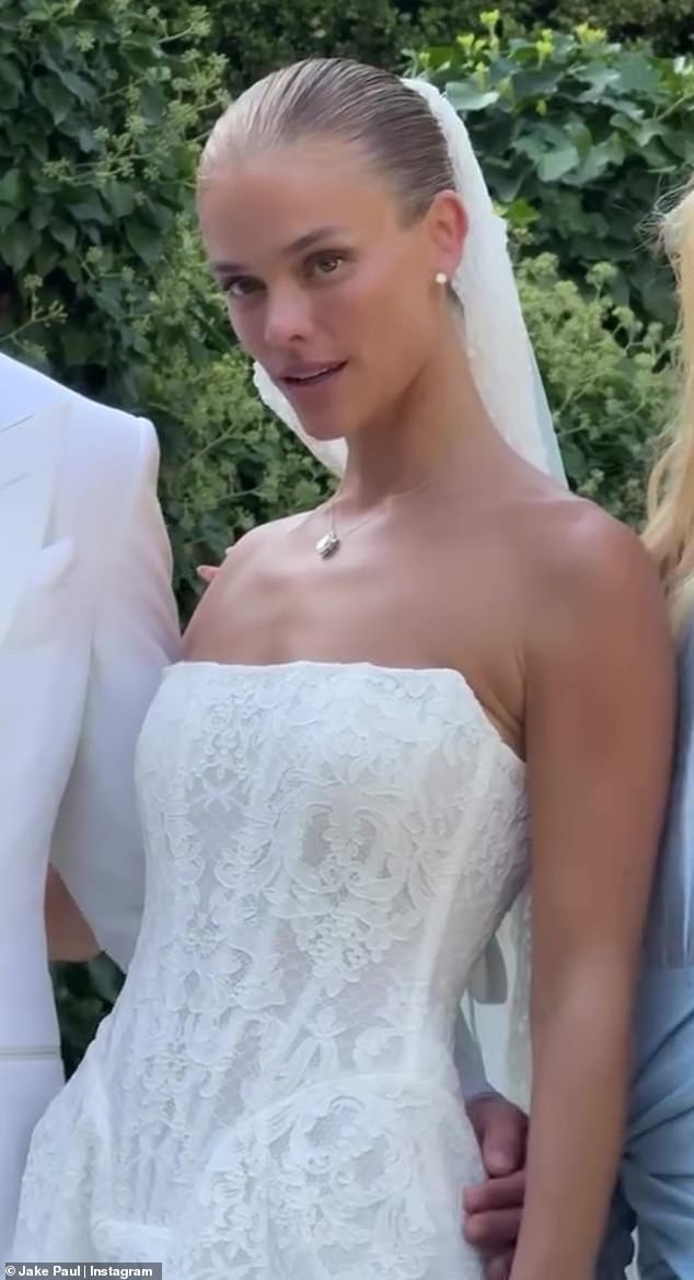 The model wore earrings and a necklace as she went light on her makeup